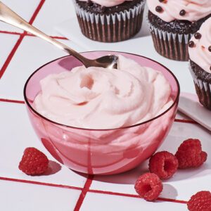 Raspberry cream cheese frosting in a bowl