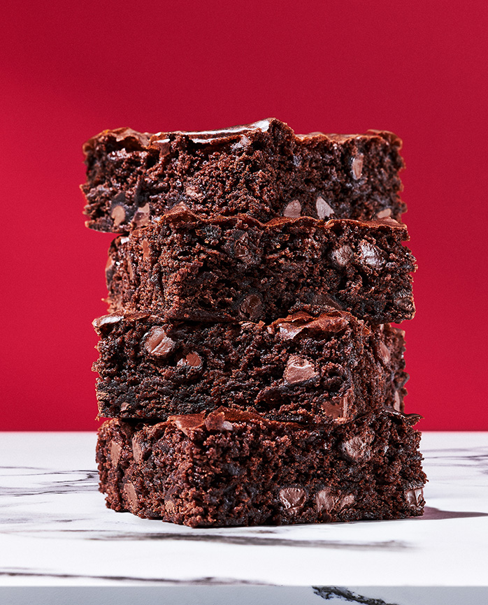 Stack of chocolate brownies made from Krusteaz Batters