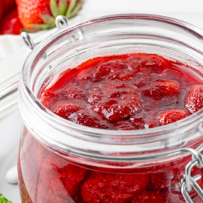 Strawberry jam in a glass container